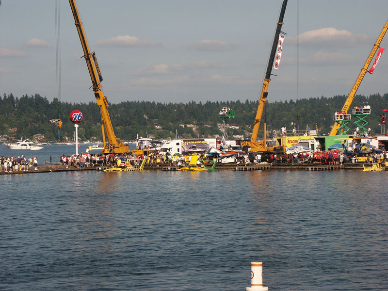 Hydroplane race pit with cranes